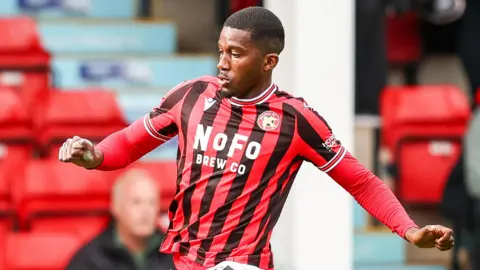 Daniel Kanu in action for Walsall