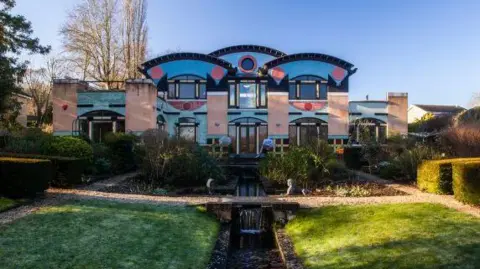 Phil Sayer / C20 Society The landscaped garden at the back of the house with a watercourse representing the Nile