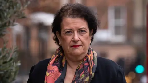 PA Media Retired senior judge Deborah Taylor KC outside Mary Ward House in London