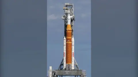 The Nasa Artemis II rocket sits on its launch pad