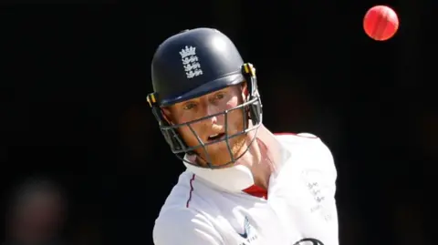 Ben Stokes ducks out of the way of a pink ball bouncer during the second Ashes Test in Brisbane 