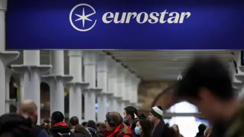 Reuters Passengers queue at the Eurostar departure gates at St Pancras in London last December