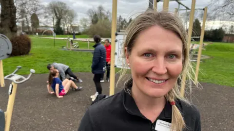 An instructor at the outdoor gym