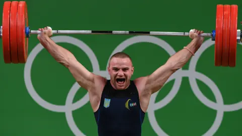 Ukraine's Oleksandr Pielieshenko competes during the men's weightlifting 85kg event at the Rio 2016 Olympic Games
