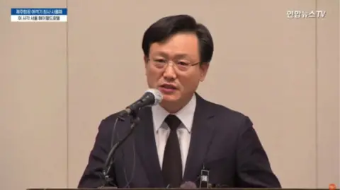 Screen capture of Jeju Air CEO Kim Yi-bae at a press conference in Seoul on December 31, 2024