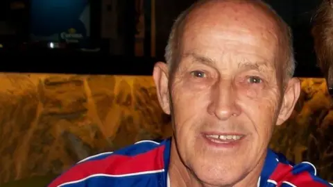 Jasmine Powell Valentine Powell, smiling and appearing with balding hair