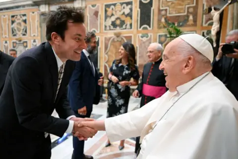 Getty Images Late-night host Jimmy Fallon with Pope Francis 