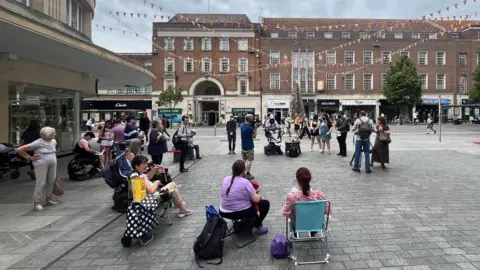 Protesters against welfare cuts at a demonstration in Bedford Square in Exeter