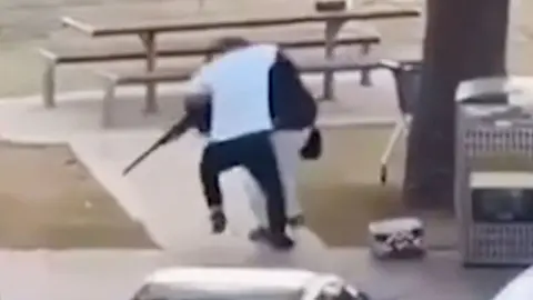 Ahmed al Ahmed wrestles a gun off a terrorist during the Bondi beach attack in Sydney, Australia