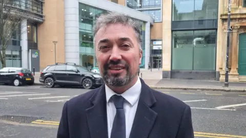 Chris McCracken, managing director of Linen Quarter BID (business improvement district), on Bedford Street in Belfast city centre