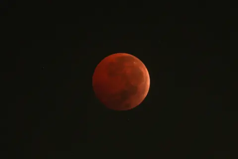 Reuters A full moon is seen during a "Blood Moon" total lunar eclipse from Rio de Janeiro, Brazil