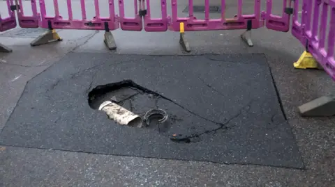 John Devine/BBC A sinkhole in Wisbech