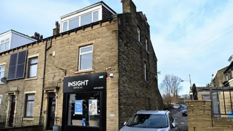 The exterior of the building on Barkerend Road.