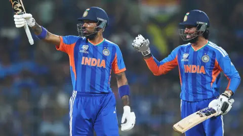 Hardik Pandya celebrates his half-century