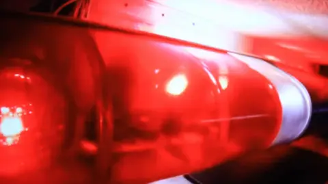 Getty Images Stock image of a flashing light atop a fire truck