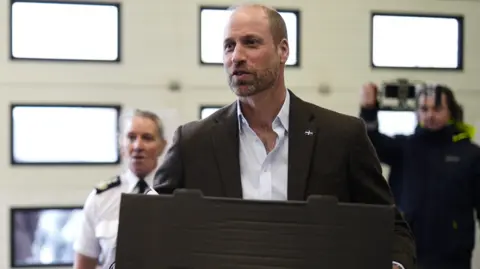 PA Media The Prince of Wales, known as the Duke of Cornwall while in Cornwall, delivers a box of pasties to firefighters and multi-agency responders at Helston Community Fire Station.