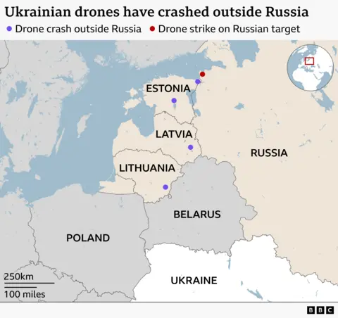 Alt text: Map showing the Baltic region and parts of eastern Europe. Countries labelled include Estonia, Latvia, Lithuania, Belarus, Russia, Poland, and Ukraine. Purple dots mark reported drone crash sites outside Russia in Estonia, Latvia, and Lithuania, while a red dot near the Estonia–Russia border indicates a drone strike on a Russian target. An inset map highlights the region’s location within Europe.