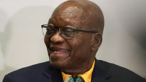 uMkhonto weSizwe (MK) party leader and South Africa's former president Jacob Zuma (C) gives a press conference in Johannesburg on June 16, 2024