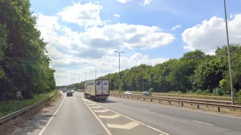 Google A general view of the eastbound carriageway of the A1139 Fletton Parkway. Vehicles can be seen travelling down both sides of the dual carriageway. The carriageway is lined with trees on either side. 