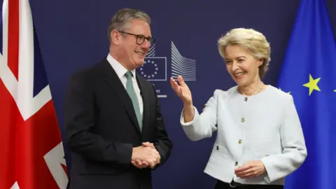 EPA British Prime Minister Keir Starmer (L) is welcomed by European Commission President Ursula Von der Leyen (R) at the EU Commission headquarters in Brussels, Belgium.