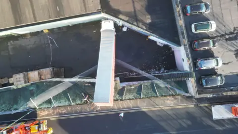 Phil Barnet/PA Wire An overhead drone view of the stricken lorry