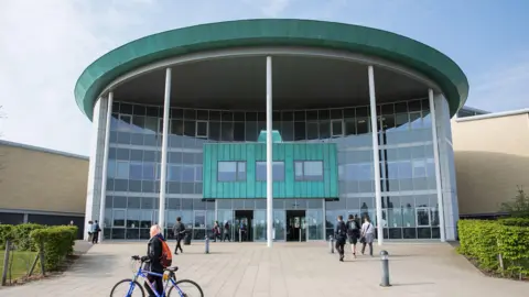 Northampton College The front of Northampton college. A glass educational building 