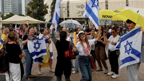 A New Dawn: Israelis Celebrate Release Deal of Hostages