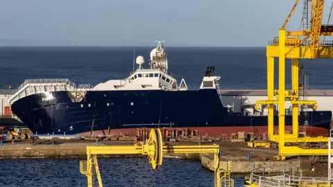 SHUTTERSTOCK The toppled RV Petrel