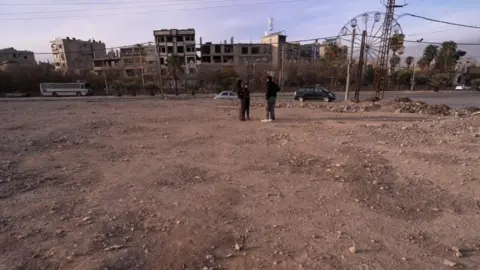 An open field in Douma, Eastern Ghouta outside Damascus, where relatives of chemical weapons victims believe they may be buried (10 December 2024)