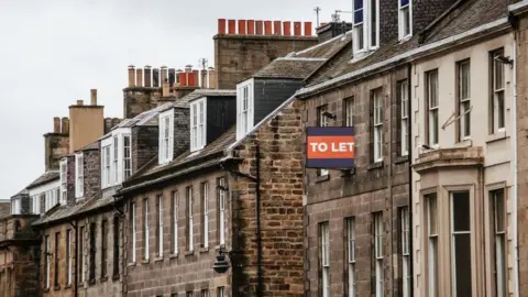 Getty Images rows of aged  looking tenement flats