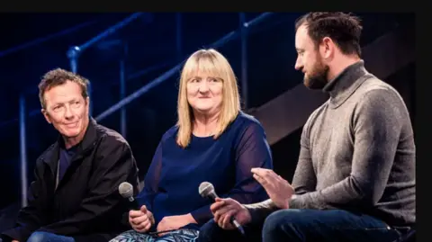Nottingham Playhouse Joan and her ex-husband David listen to Jacob Dunne at a Q&A