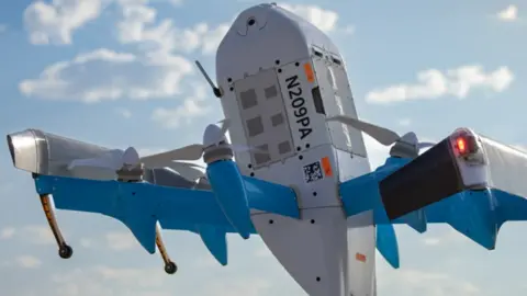 Amazon An Amazon delivery drone in the air