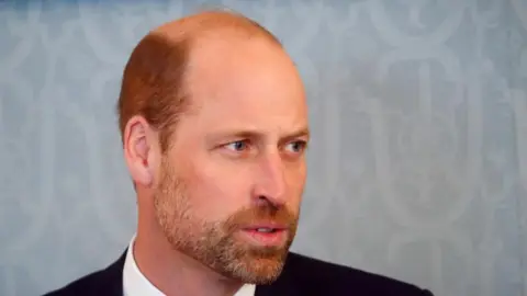 EPA Prince William is seen with head and shoulders in the photo. He is speaking at an event in Talinn and is wearing a dark suit with white shirt.