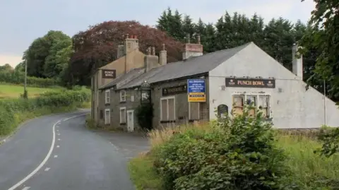 CHRIS HEATON/GEOGRAPH Street view of the Punch Bowl Inn