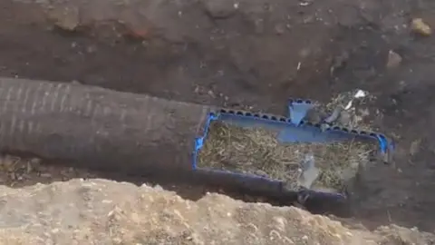 Sudbury Fire Station The underground pipe that the dog was rescued from. A section of the top of it has been cut away to rescue the dog.