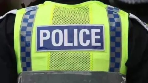 Getty Images A police officer in hi vis