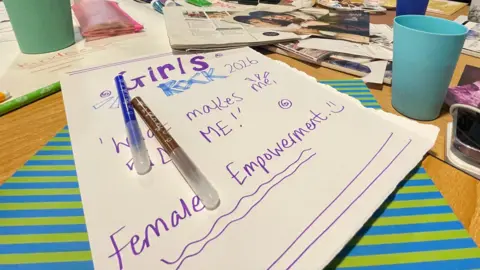 A home-made poster with coloured pens