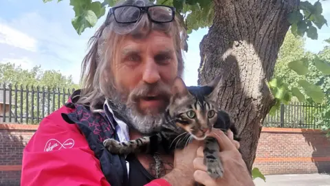 Paul Hoggard Paul Hoggard holding Tilly