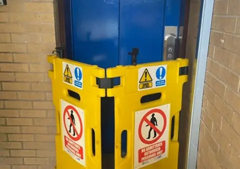 Wayne Hughes The out of order lift 