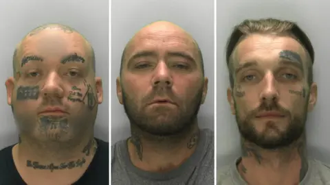 Mug shots of three men. The man on the left is bald with face tattoos, the man in the centre is bald with neck tattoos and the man on the right is blonde with face tattoos.
