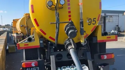BBC cesspit truck deposing of waste 