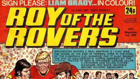 Rebellion The cover of Roy of the Rovers cover, showing footballers and a man in a flat cap. 