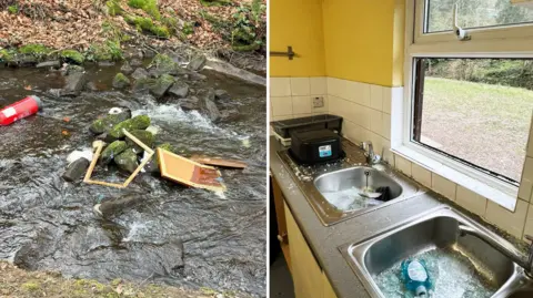 Tansley Wood Scout Campsite Two images. Left, there is a brook with a fire extinguisher, broken frame, notice bards and toilet rolls in it. There is a leafy bank on either side of the brook. Right, there is a kitchen with white tiles, yellow walls, metal sinks, black draining rack, a black washing bucket and a soap dispenser. There is broken glass across this worktop, next to a window with no glass. Outside, there is a grassy area with trees in the distance. 