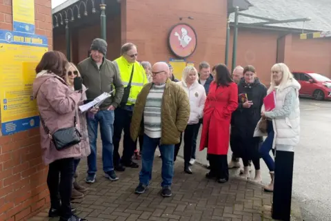 People gathered at Syston Town Square car park