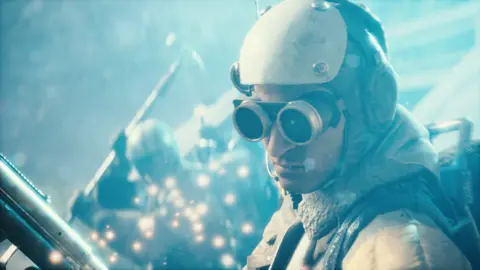 Embark Studios Screenshot from Arc Raiders show a character with black, protective goggles and what looks like a old-fashioned pilot's suit with fur collar and protective headwear with a comms headset built in. Sparks fly around them as a colleague prepares to swing a large pickaxe-like object.