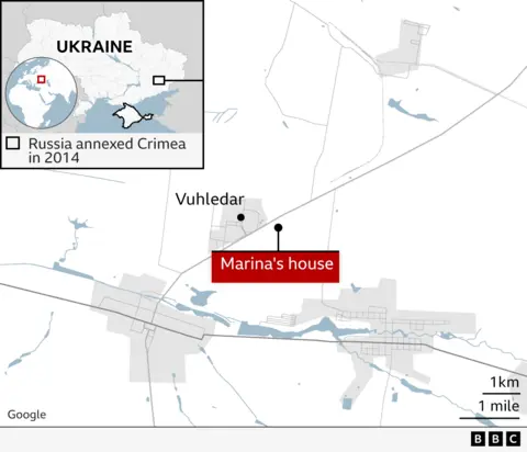 Map showing the location of Vuhledar in eastern Ukraine and the location of Marina's house.