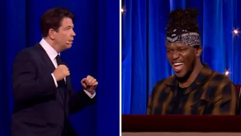 Composite image of Michael McIntyre in a boxing pose and KSI laughing