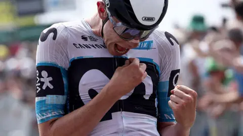 Ivan Romeo celebrates winning stage three of the 2025 Criterium du Dauphine