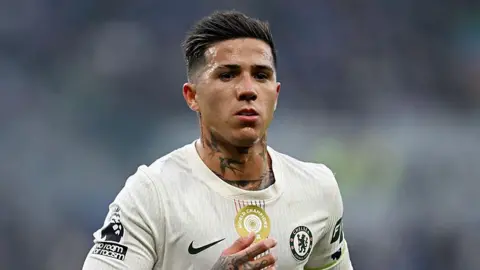 Enzo Fernandez wearing a white Chelsea shirt