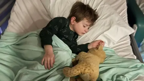 Family Harris in the Derby Royal Hospital two years ago when eggs were delivered to the children there